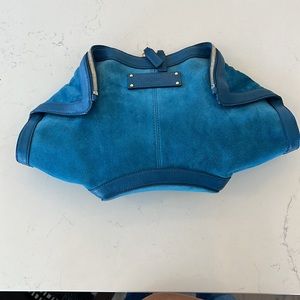 Alexander McQueen petroleum blue suede and leather trim DeManta clutch.